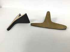 A pair of Carl Aubock t-shaped bookends, cast bronze from a 1948 design, both bearing stamps (5cm x