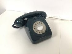 A 1980s Rotary dial telephone in teal (h.13cm)