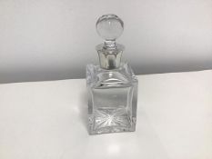 A small square decanter with silver collar, stamped for Birmingham and possibly makers mark C&G,