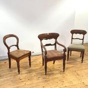 Three Scottish Victorian mahogany chairs, the elbow chair with curved top rail, scroll mid rail