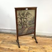 A 1930s burr walnut framed firescreen, the rectangular frame with moulded top enclosing a