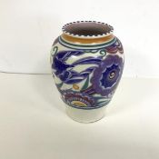 A 1930s Poole Pottery vase of urn form with polychrome floral and bird decoration, stamped Poole,