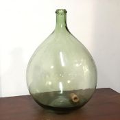 A large Victorian hand blown bottle vase of bulbous form (47cm x d.30cm)