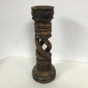 An early 20thc oak barley twist candlestick (h.45cm)