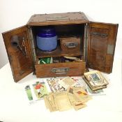 A smoker's cabinet, c.1900, the rectangular top bearing a silver plaque with inscription Presented