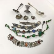 A collection of costume jewellery including a bracelet with polished stones, a bracelet with painted