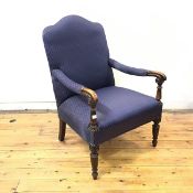 A French mid 19thc. mahogany framed armchair, the undulating back, downswept arms and padded seat