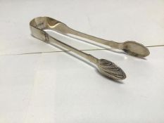 A pair of silver sugar tongs, Edinburgh 1833 with shell decoration to base of spoons and to