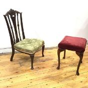 An Edwardian nursing chair, the shaped top rail incorporating roundel, above a tapering splat with