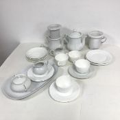 A collection of white and pale grey tea china, marked Minton or Bavaria or unmarked, including two