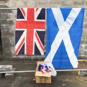 A collection of flags to include a fabric sewn Union Jack, a similar Scottish Saltire and a