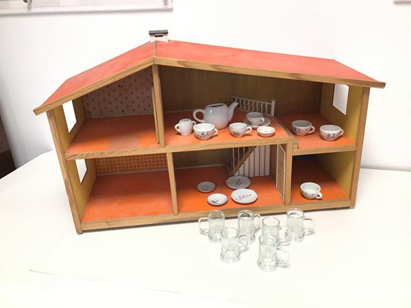 A 1970s doll's house with five rooms and stairwell (42cm x 71cm x 27cm), also a set of child's