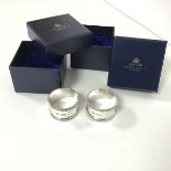 A pair of Edinburgh silver napkin rings from Hamilton & Inches, Edinburgh with entwined engraved