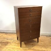 A 1960s chest of six graduated drawers, raised on tapering square section legs (116cm x 66cm x