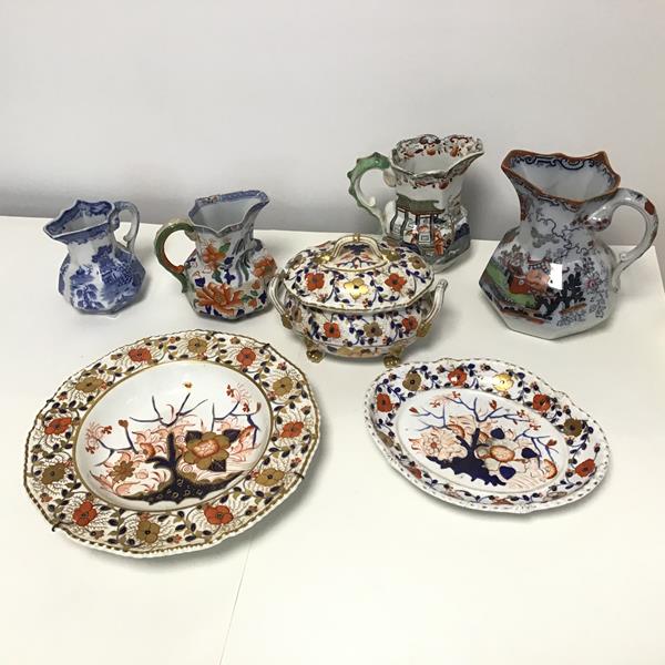 A mixed lot comprising a collection of Ironstone pitchers, all with Chinese inspired decoration