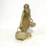 An early 20thc Vienna china figure of a Girl holding Baskets, signed to base Dorbrich (?), stamped