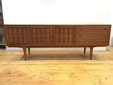 A 1960s sideboard by Younger, the rectangular top above a bank of three drawers and three