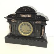 An early 20thc slate mantle clock with inlaid marble and arched pedimented top (h.30cm x 35cm x