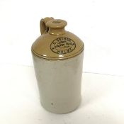 An early 20thc stoneware demi john bearing the stamp, E. Grange Hulme Junction Hotel (h.32cm x d.