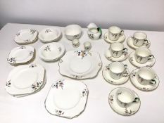 A collection of 1920/30s Tuscan china including teacups and saucers, sugar bowl, milk jug, egg cups,