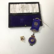 A 1920s Birmingham silver presentation medal with enamel to front and inscribed Justice, Truth,