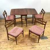 A 1960s dining room suite, to include a gateleg table and set of four chairs, each with horizontal