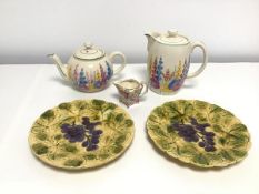 A 1930s tea and coffee pot (h.15cm x 16cm x 11cm), handpainted with flowers, a small milk jug,