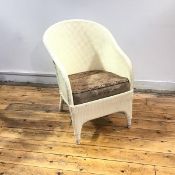 A 1940s woven armchair in the style of Lloyd Loom, the hooped shaped back enclosing a drop in