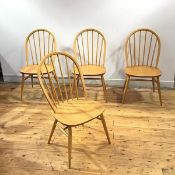 A set of four Ercol dining chairs, the ash frames with hooped back and turned spars above shaped