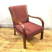 A mid century armchair by Parker Knoll, the upholstered back and seat within downswept arms and