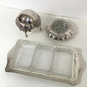 An Epns hors d'oeuvre tray with pierced edge and three rectangular removeable dishes, on bun feet (