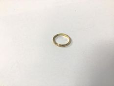 An 18ct gold wedding band with Birmingham hallmark (R) (3.26g)