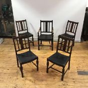 A set of six 1920s oak dining chairs, each rectangular back with solid splat above shaped saddle