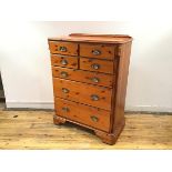 A modern pine and ebonised chest, possibly American, the rectangular top with shallow gallery and