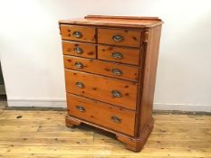 A modern pine and ebonised chest, possibly American, the rectangular top with shallow gallery and