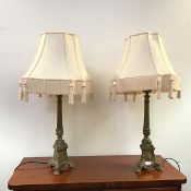 A pair of modern brass table lamps in the Classical taste, each with fluted column embellished