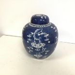 A modern Chinese blue and white ginger jar, with cherry blossom decoration (h.24cm x 20cm)