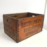 A mid 20thc bottle crate inscribed Scottish & Newcastle Breweries Ltd., Edinburgh also bears