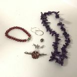 A mixed lot including a polished amethyst chip necklace with a lobster claw clasp marked 925, a