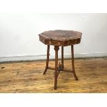 A hardwood and boxwood inlaid occasional table, the octagonal top inlaid with a stylised flower to