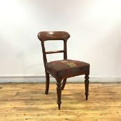 A Victorian mahogany side chair, the shaped top rail and moulded mid rail above an upholstered seat,