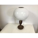 A mid century style table lamp, the opaque acrylic dome shaped shade supported by a brass stem