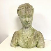 A cement bust of a Young Lady with visible details to her blouse and a pendant, possibly carved