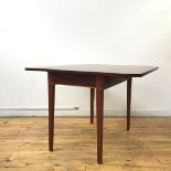 A George III mahogany pembroke table, the rectangular top with rounded angles above a frieze drawer,