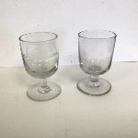 A pair of crystal wine glasses, possibly 18thc. Irish, one inscribed J. Duncan & Co. (h.11cm x d.