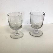 A pair of crystal wine glasses, possibly 18thc. Irish, one inscribed J. Duncan & Co. (h.11cm x d.