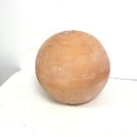 A terracotta garden sphere, undecorated, with an opening to base (d.27cm)