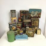 A large collection of assorted tins including Weetabix, Ostermilk, Melrose's Tea, Three Nuns Tobacco