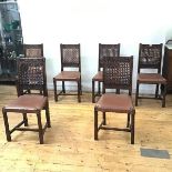 A set of six oak dining chairs in the 17thc style, each rectangular back with acanthus carved