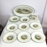 A set of twelve 1930s Woods Ivoryware fish plates, each plate with freshwater fish to base of well